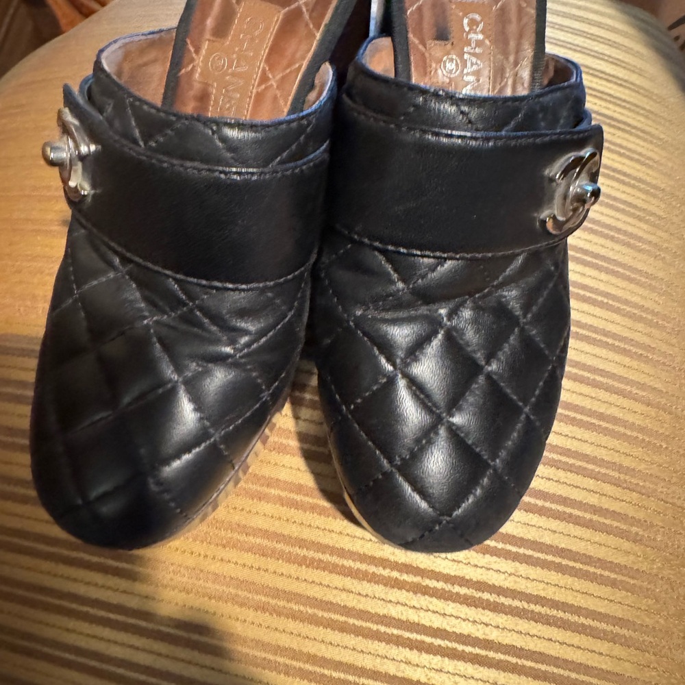 Worn Chanel clogs some scuffs